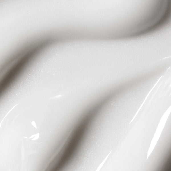 Close-up of a smooth, white surface with subtle texture