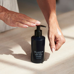 Olverum Soothing Hand Lotion being applied to a wrist