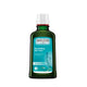 Weleda revitalising hair tonic bottle on a white background
