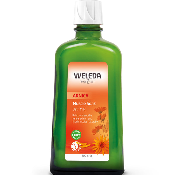 Weleda Arnica Muscle Soak bottle on a white background