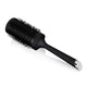 Black round hairbrush on a white background