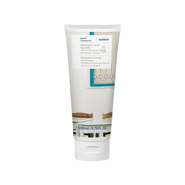 Korres body milk tube on a white background