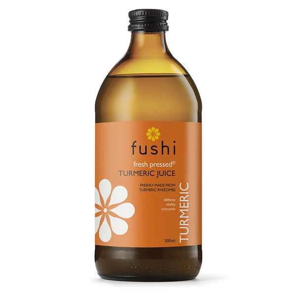 Bottle of fushi fresh pressed turmeric juice on a white background