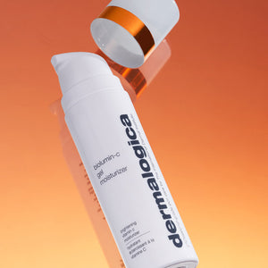 Dermalogica bottle of Blemish + C Gel Moisturizer on an orange gradient background
