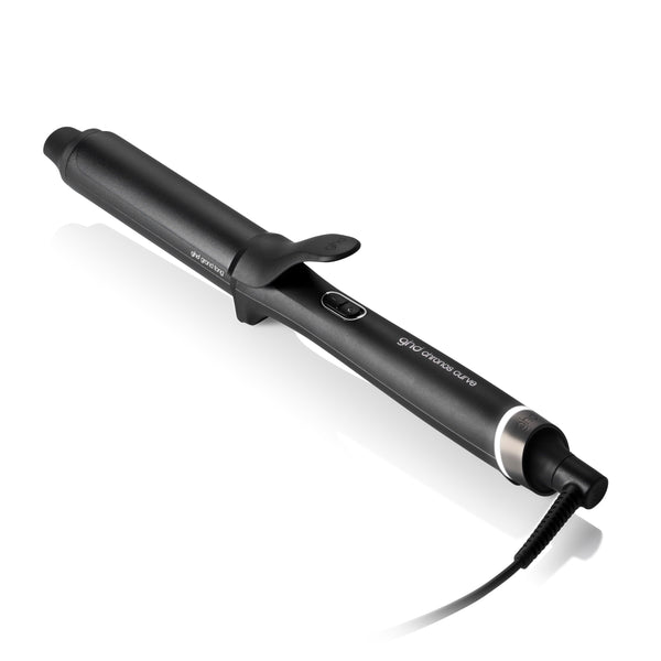 Black hair curling iron with visible brand on a white background