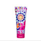 Colorful tube of mika hair product on a white background
