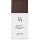 Daily Tinted Fluid Sunscreen bottle with brown cap and white body on a white background