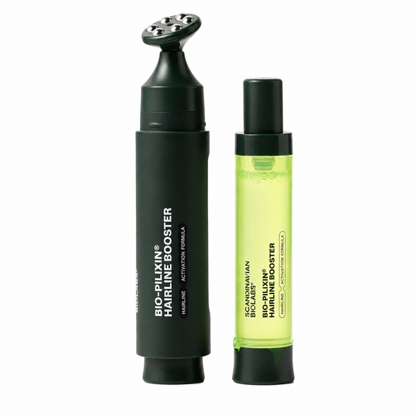 Two dark green hair care bottles on a white background: a larger Bio-Pilkin Hairline Booster bottle with a rounded applicator top and a smaller Bio-Pilkin Bio-Filling Hair Booster bottle with a translucent light green liquid.