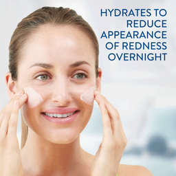 Model applying cream to her face. Text: Hydrates to reduce appearance of redness overnight