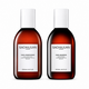 Two bottles of Sachajuan Curl Shampoo and Curl Conditioner on a white background