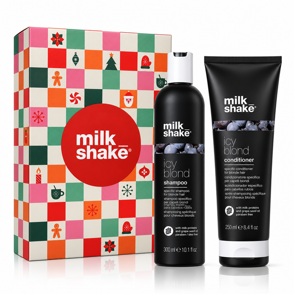Milk Shake Icy Blond hair care set featuring a 300 ml bottle of shampoo and a 250 ml tube of conditioner, displayed next to their colorful Christmas-themed gift box on a white background.