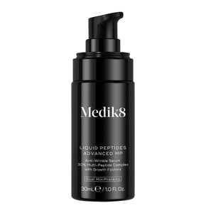 Black Medik8 serum bottle on a white background