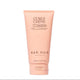 A tube of NAK HAIR Curls Creme hair product in a soft peach-pink color, centered on a plain white background.