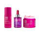 Three SAND & AXS skincare products arranged side by side on a plain white background: a pink Glow Berry serum bottle, a purple emulsion dropper bottle with a red dropper top, and a bright pink emu apple sheer bounce mask jar with the lid off and pink cream visible.