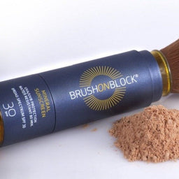 close up of Brush On Block SPF 30 and the mineral powder next to it
