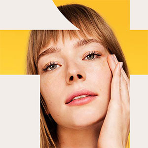 Model applying skincare