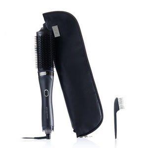 Hair styling tool with attachments on a white background