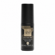 A bottle of ghd Curly Ever After travel size curl hold spray on a solid white background.