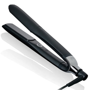 Black hair straightener on a white background