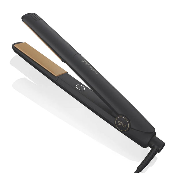 Black hair straightener with gold accents on a white background