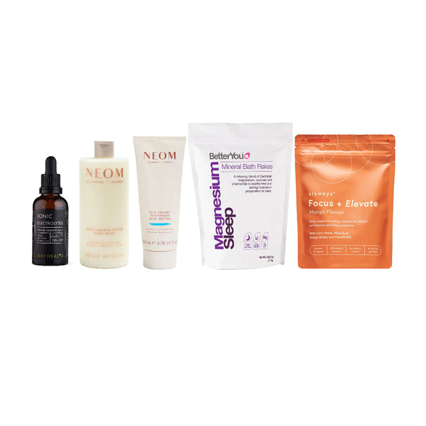 A five-item wellness bundle featuring a dark amber dropper bottle, a cream-colored bottle, a white tube, a white stand-up pouch, and an orange stand-up pouch, arranged in a row against a plain white background.