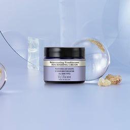Neal's Yard Remedies Frankincense Intense Age Defying Eye Cream in front of a clear orb