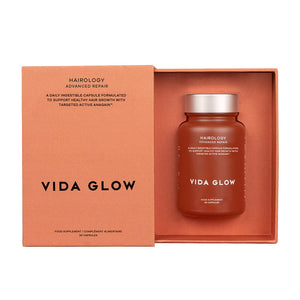 Orange Vida Glow Hairology tub inside box