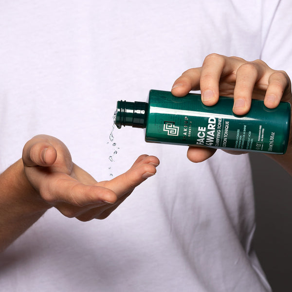a person applying the toner to their hand