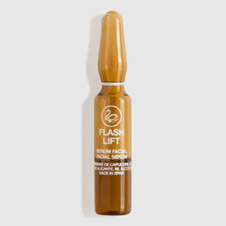 Amber glass serum bottle labeled 'Flash Lift' on a white background