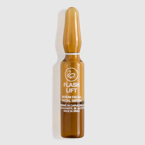 Amber glass serum bottle labeled 'Flash Lift' on a white background