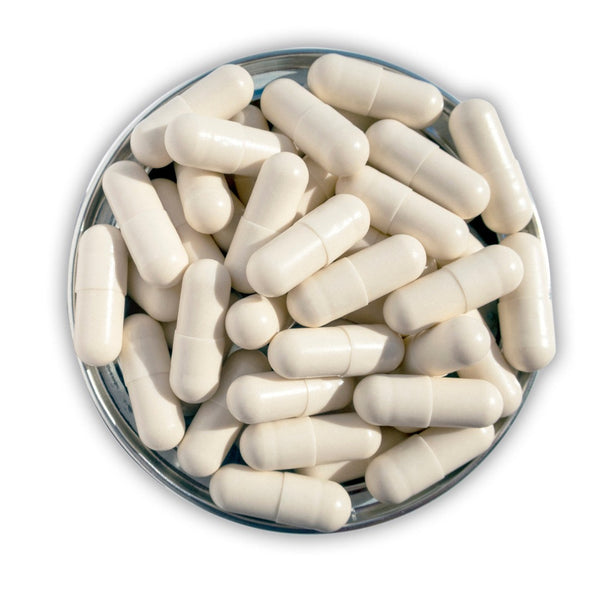 an open top of Advanced Nutrition Programme Colostrum-C showing a full tub of pills
