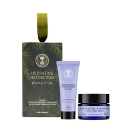A skincare gift set from The Ordinary featuring the 'Hydrating Heroes Duo' box, a lavender 'Rejuvenating Frankincense Cleanser' tube, and a dark blue-purple 'Rejuvenating Frankincense Hydrating Cream' jar, arranged on a plain white background.