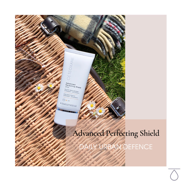 a tube of Teoxane (Teosyal) Advanced Perfecting Shield SPF 30 on a wicker basket