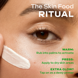 Close-up of a person applying cream to their skin with text about 'The Skin Food Ritual'.