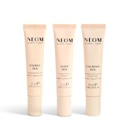 Three NEOM skincare products on a white background