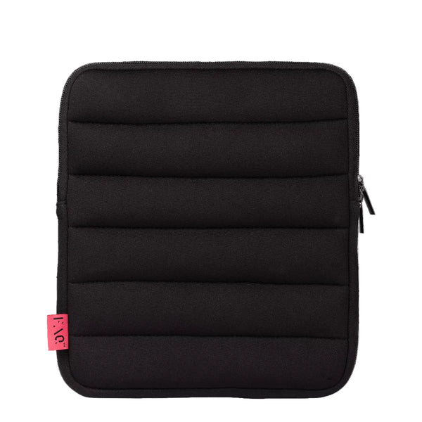 A black padded neoprene sleeve with horizontal quilting, a zippered closure, and a small pink tag on the lower left, shown against a plain white background.