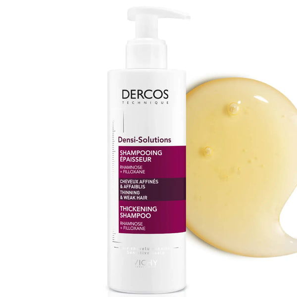Vichy Dercos Densi-Solutions Thickening Shampoo 250ml bottle next to splotch