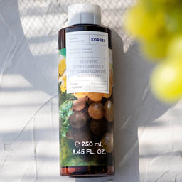 KORRES Santorini Grape Shower Gel 250ml bottle on a sunny white background