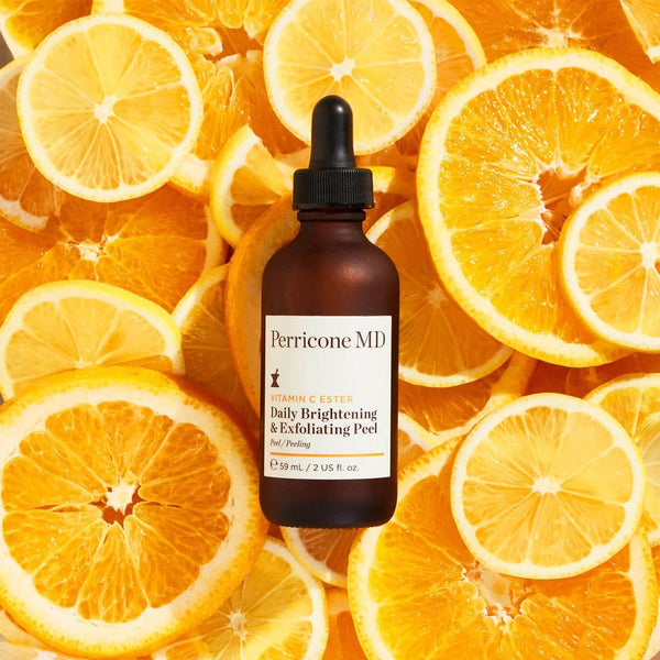 Perricone MD Vitamin C Ester Daily Brightening & Exfoliating Peel on a bed of oranges