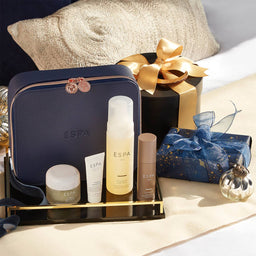 ESPA Winter Wellness Men’s Collection  next to a set of presents