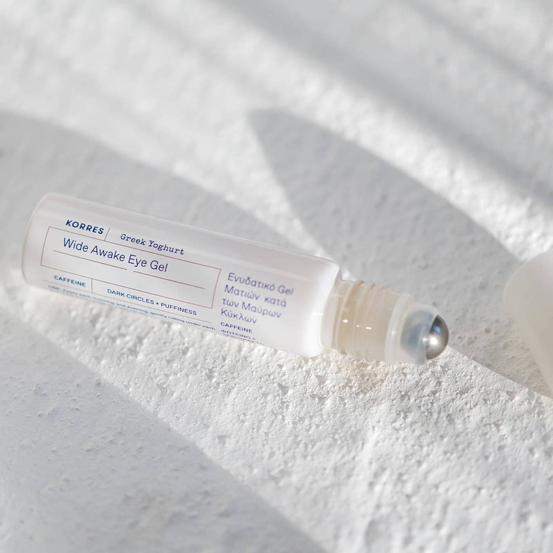 KORRES Greek Yoghurt Wide Awake Eye Gel laying on a white background