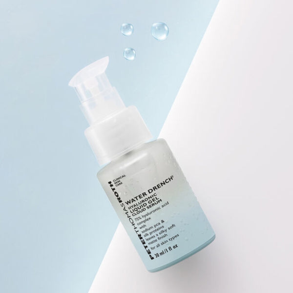 Peter Thomas Roth Water Drench Hyaluronic Liquid Gel Cloud Serum bottle with three drops of texture next to the lid