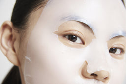 a closeup of a women with the mask applied