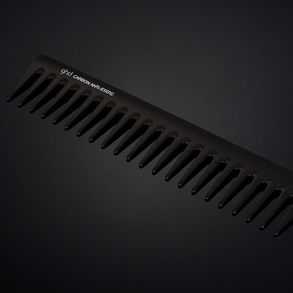 Black comb on a black background