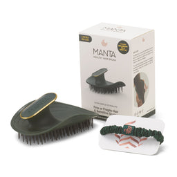 Manta Healthy Hair Brush set including a dark green flexible hair brush with gold trim, its white retail box, and a matching dark green elastic hair scrunchie on a white background.