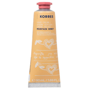 Korres mountain honey hand cream tube on a white background