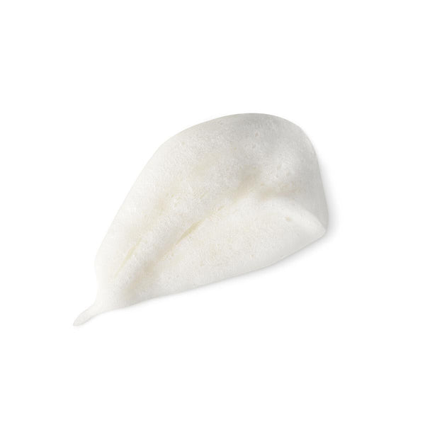 White ceramic teardrop-shaped object on a white background