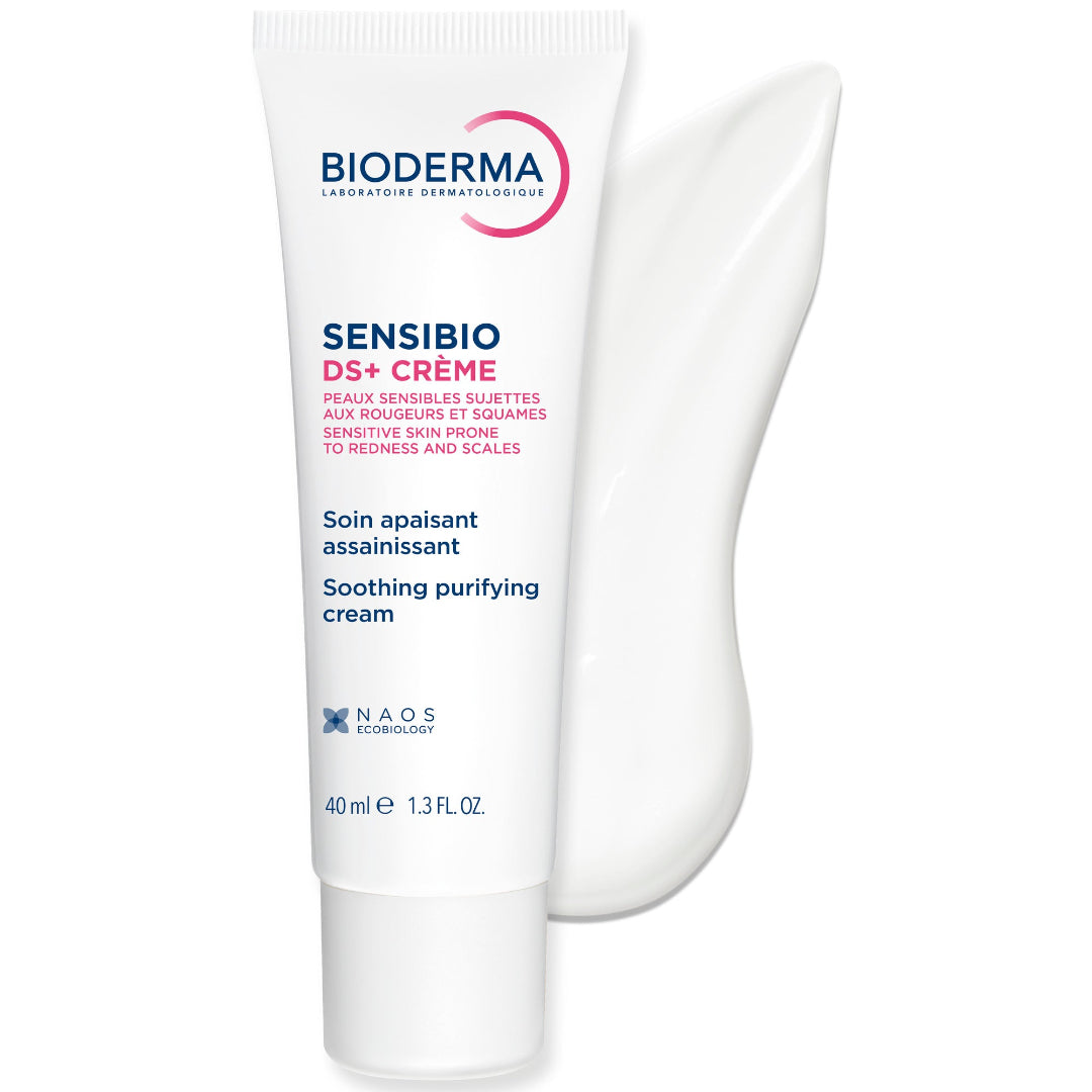 Bioderma Sensibio DS+ Crème Soothing Purifying Cream in a white squeeze tube, shown with a white cream smear behind it on a white background.