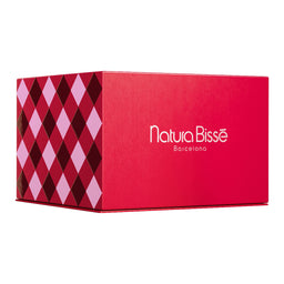 A red rectangular product box with a geometric diamond pattern on the left side and the white text 'Natura Bisse Barcelona' printed on the front, shown on a plain white background.