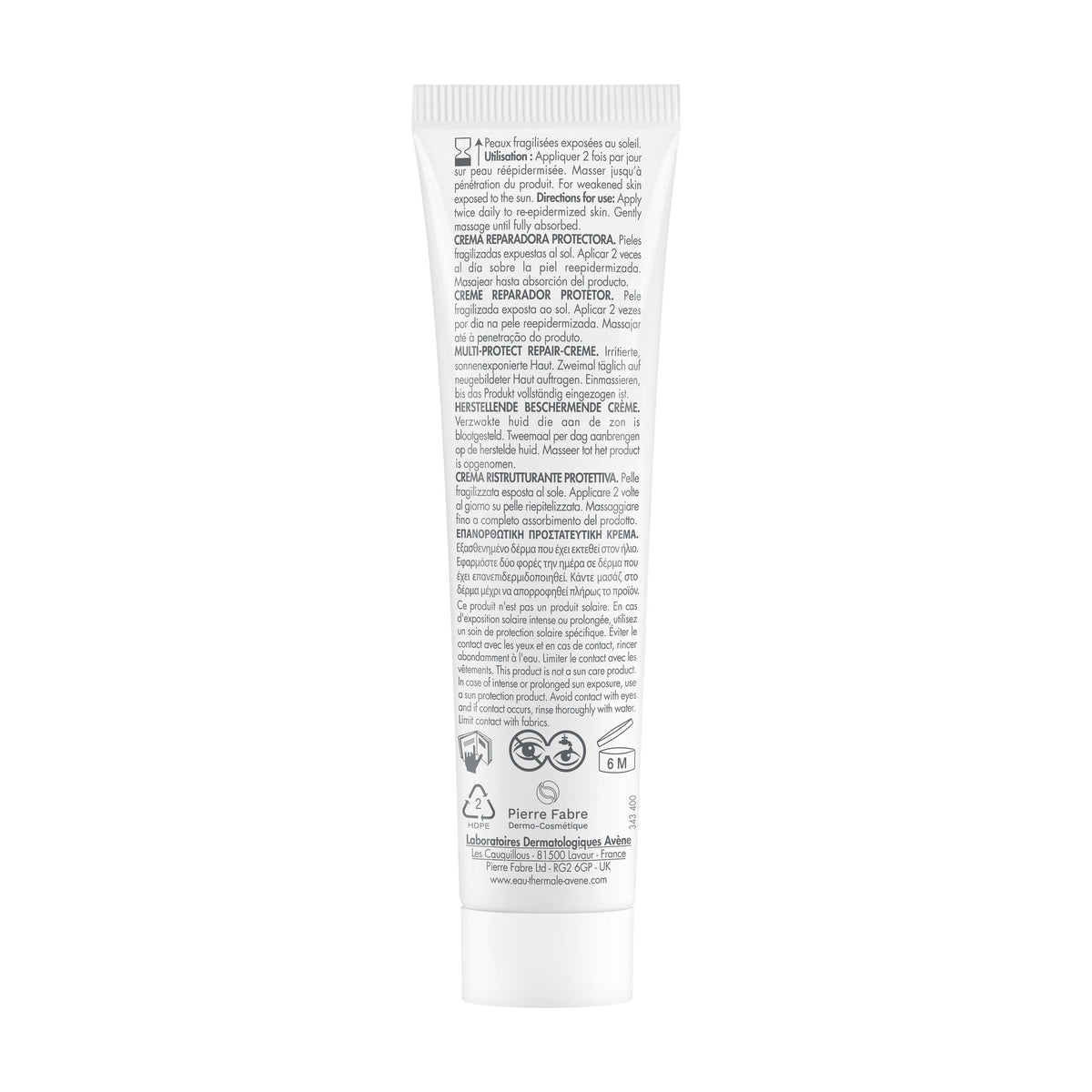 The back of a white squeeze tube of hair product, featuring detailed Spanish text, icons, and logos on a plain white background.